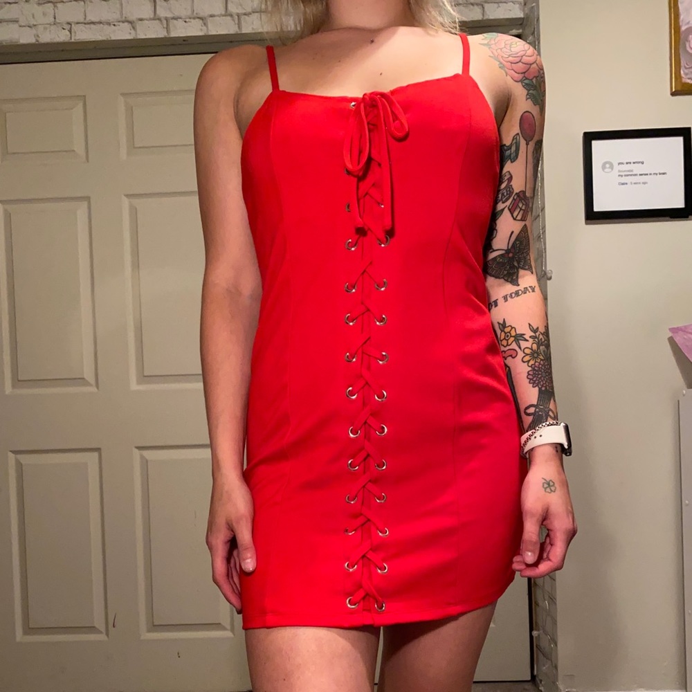 Red lace up body con mini dress